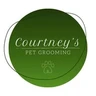 Courtney's Pet Grooming logo: a green circle with a paw print